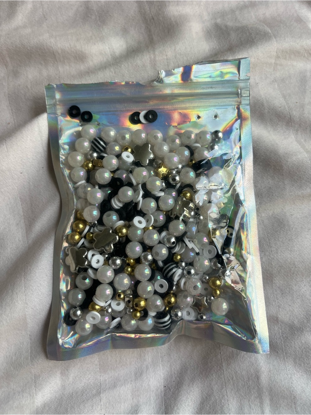 Assorted Black, White & Gold Beads artwork